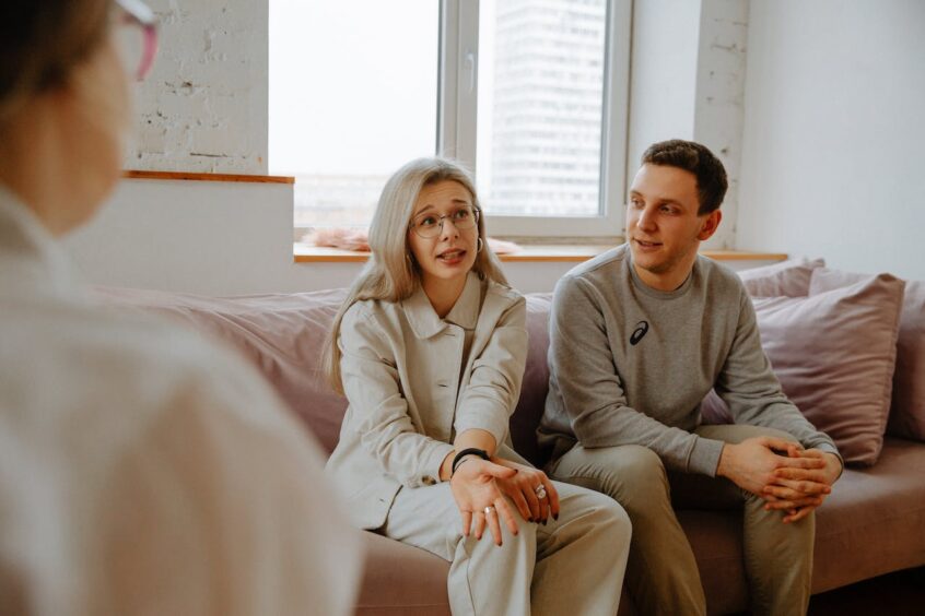 Couple Talking with Lawyer